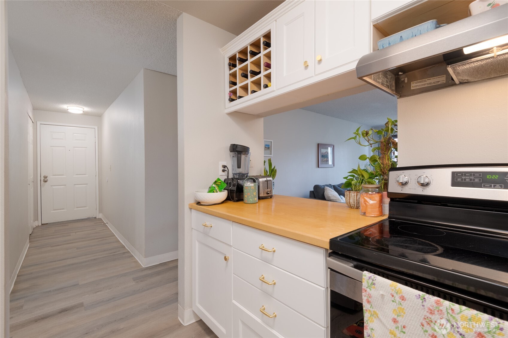 Welcoming entryway with a convenient entry closet. Enjoy LVP flooring throughout the unit for easy maintenance and cleaning. The beautifully updated kitchen is sure to please!