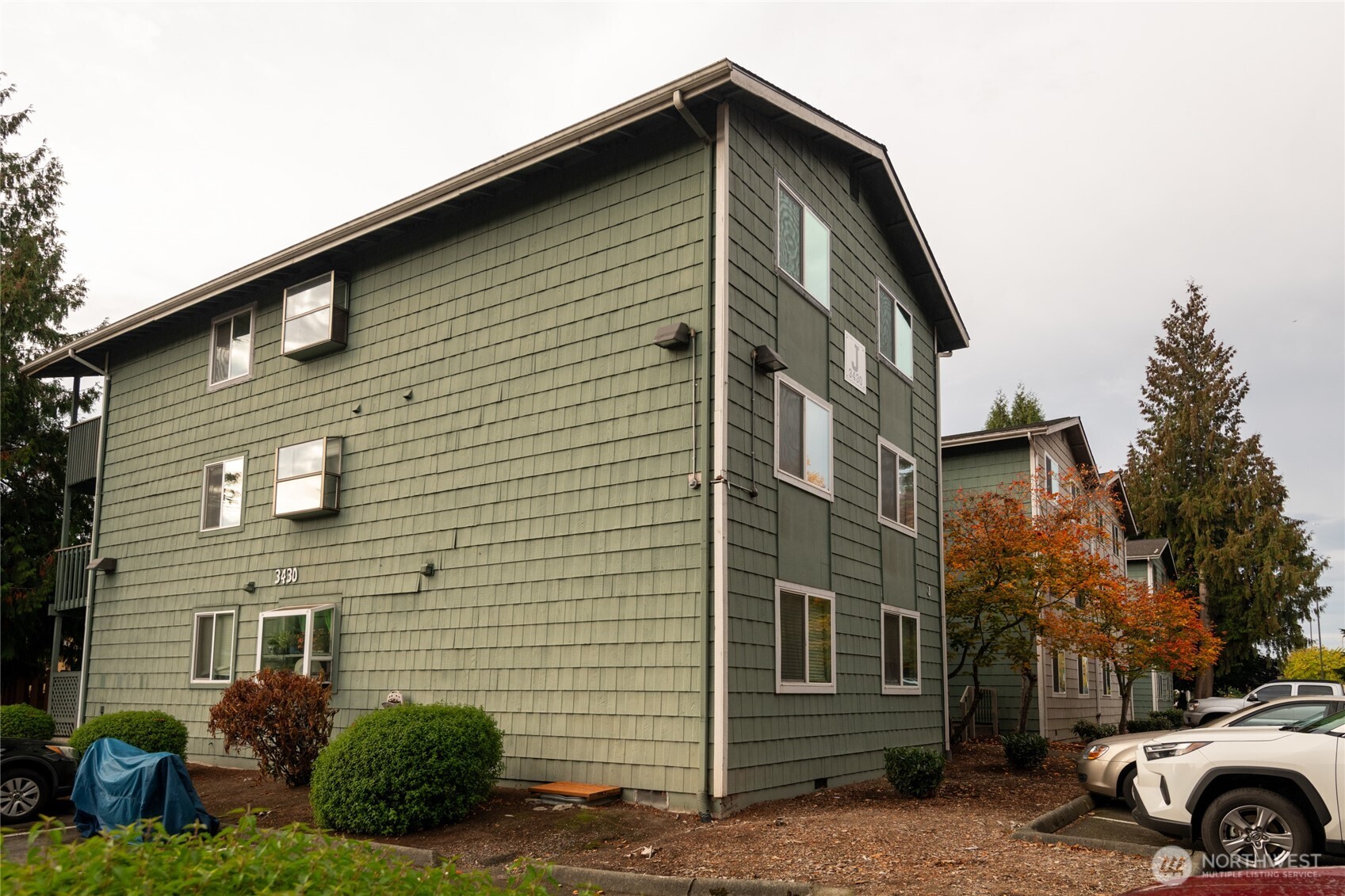 Charming condo community featuring classic architecture, mature landscaping, and convenient parking just steps from your door. The Unit has one dedicated parking space(#11) and lots of additional guest parking available.
