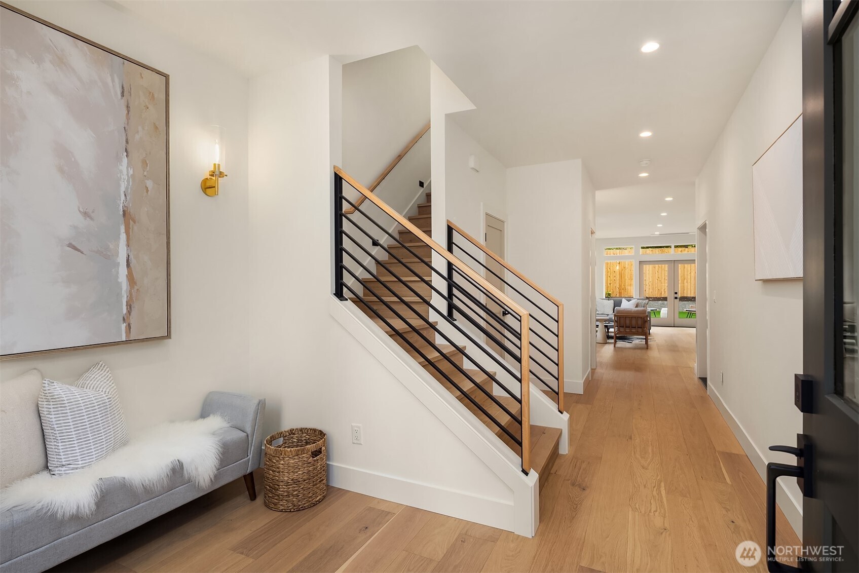 Welcoming entryway with plenty of room for a drop zone or bench