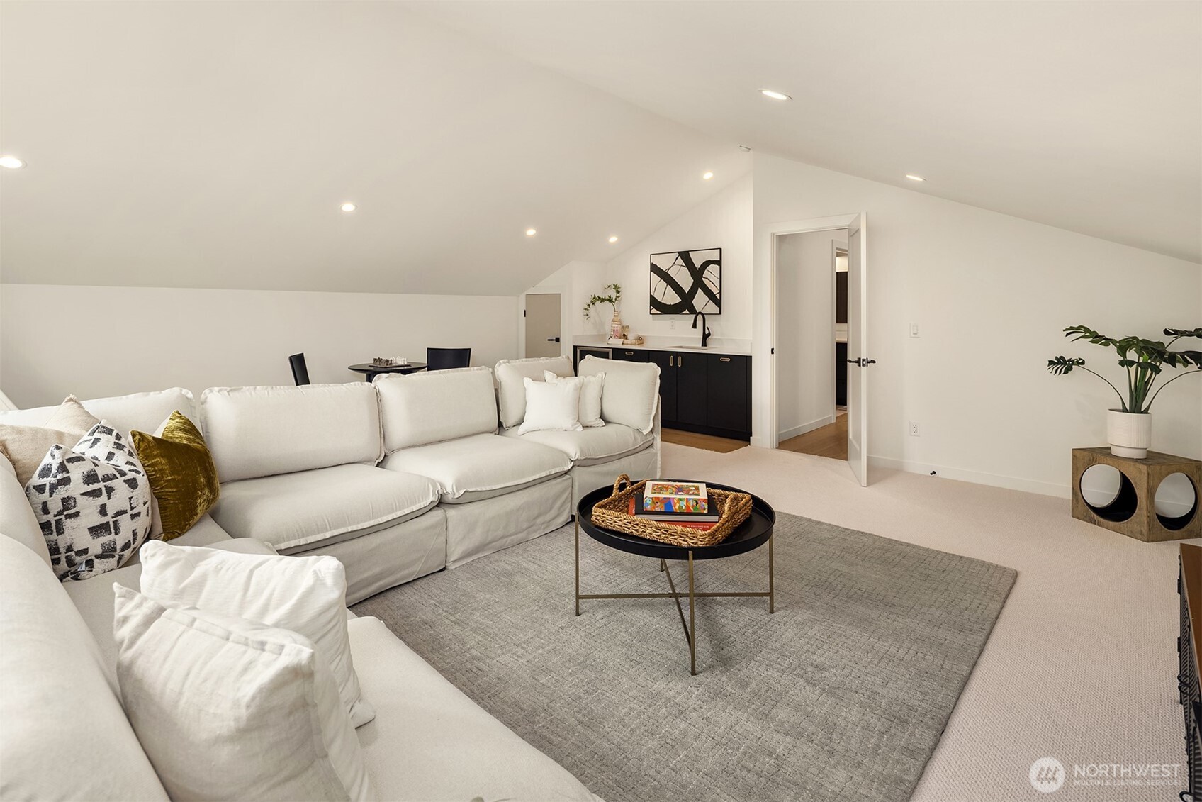 Upstairs rec room complete with wet bar and beverage center