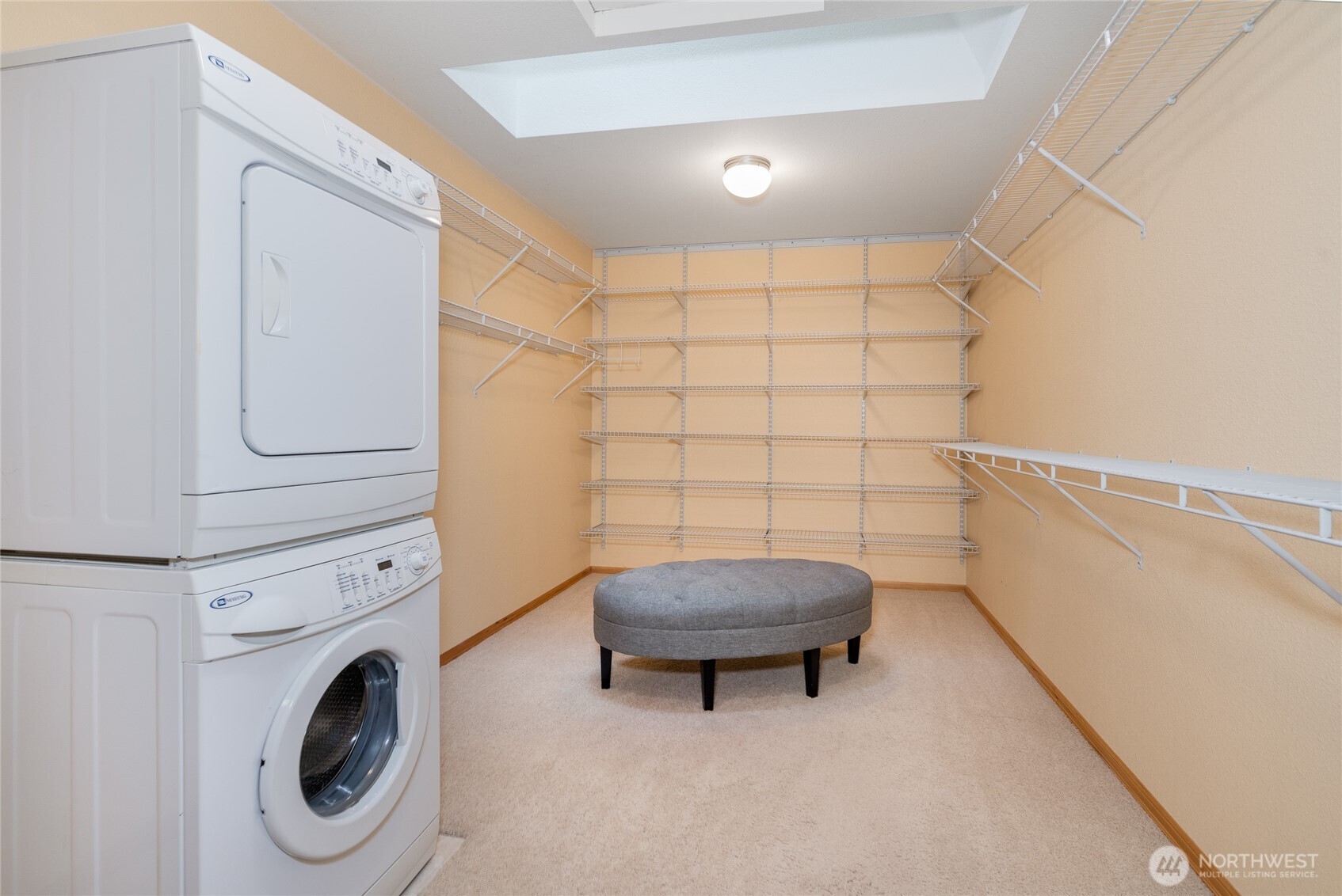 Huge walk-in closet with full size washer/dryer!