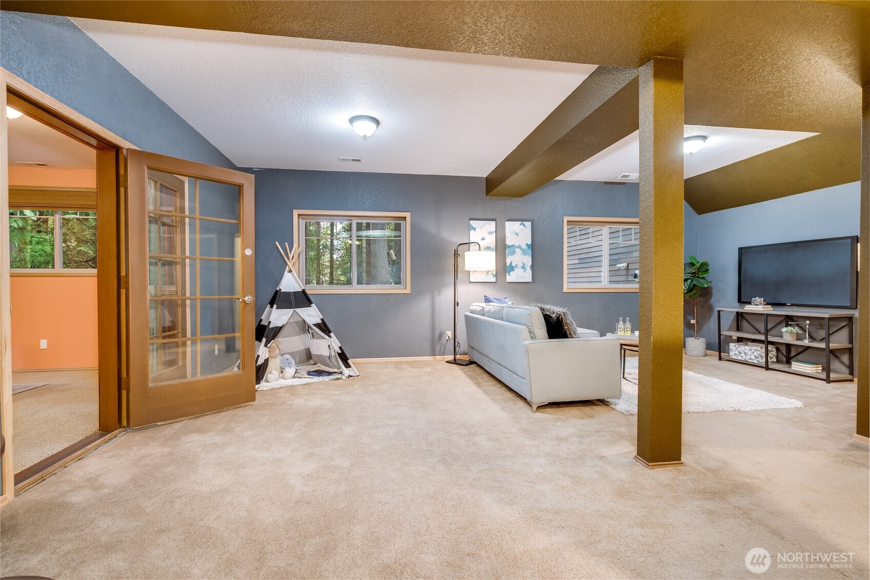 Downstairs media room, previously staged.