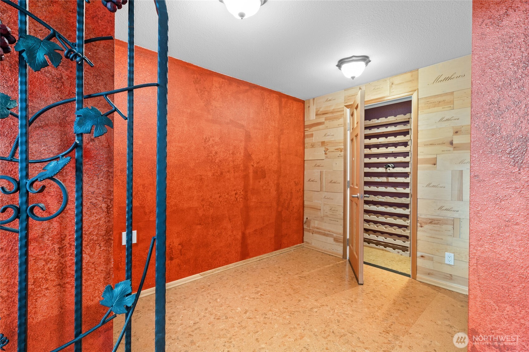 Large walk-in pantry with "command central' office space to the right and temp controlled wine cellar beyond!