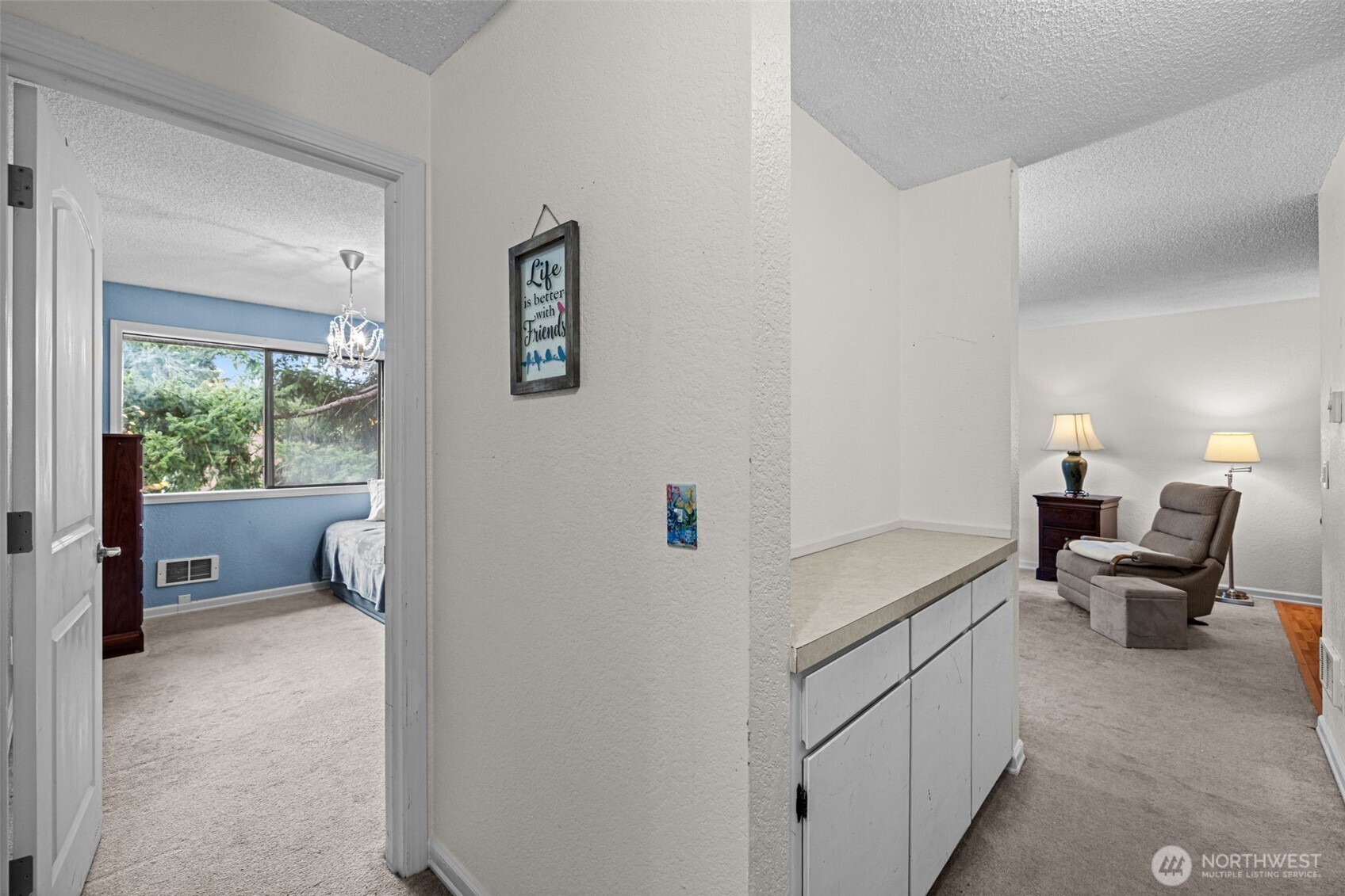 The hallway has a built-in buffet for extra storage and workspace.