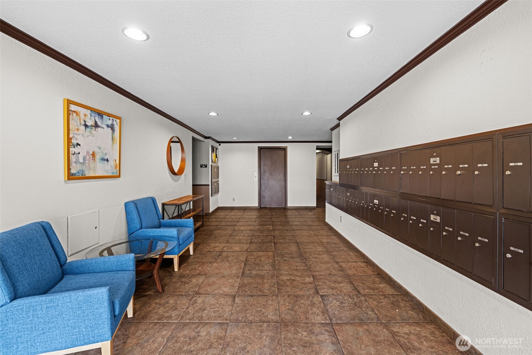 This secure building has a spacious lobby entrance.