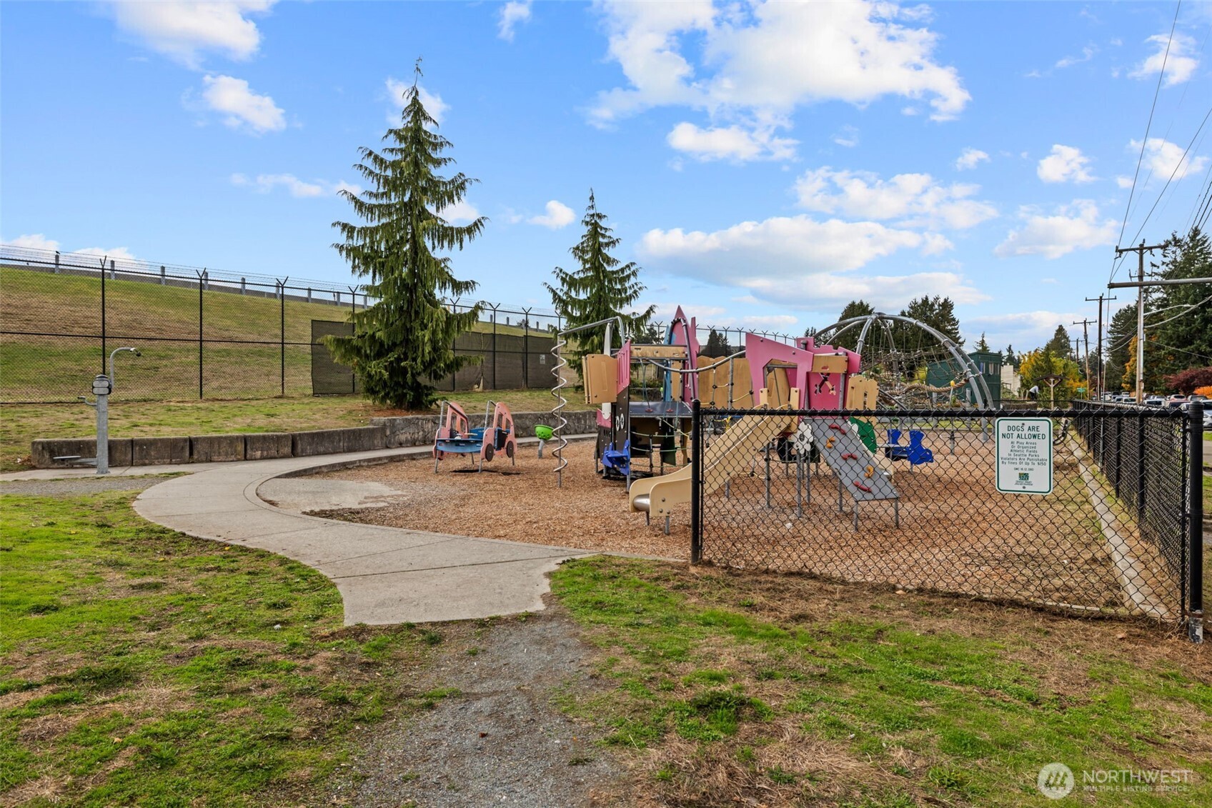 This photo shows the entrance to the parking with its security gate.