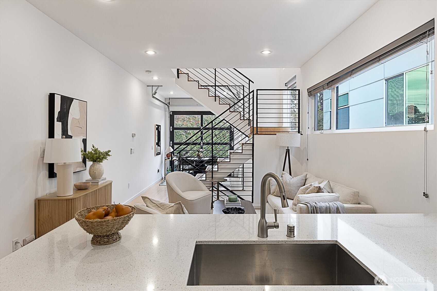 Undermount sink and floating shelves add to the urban, modern vibe!