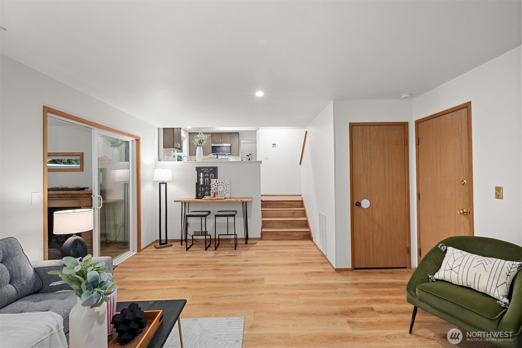 Homework or conversation is a breeze with adults on hand in the kitchen just the other side of the half-wall!