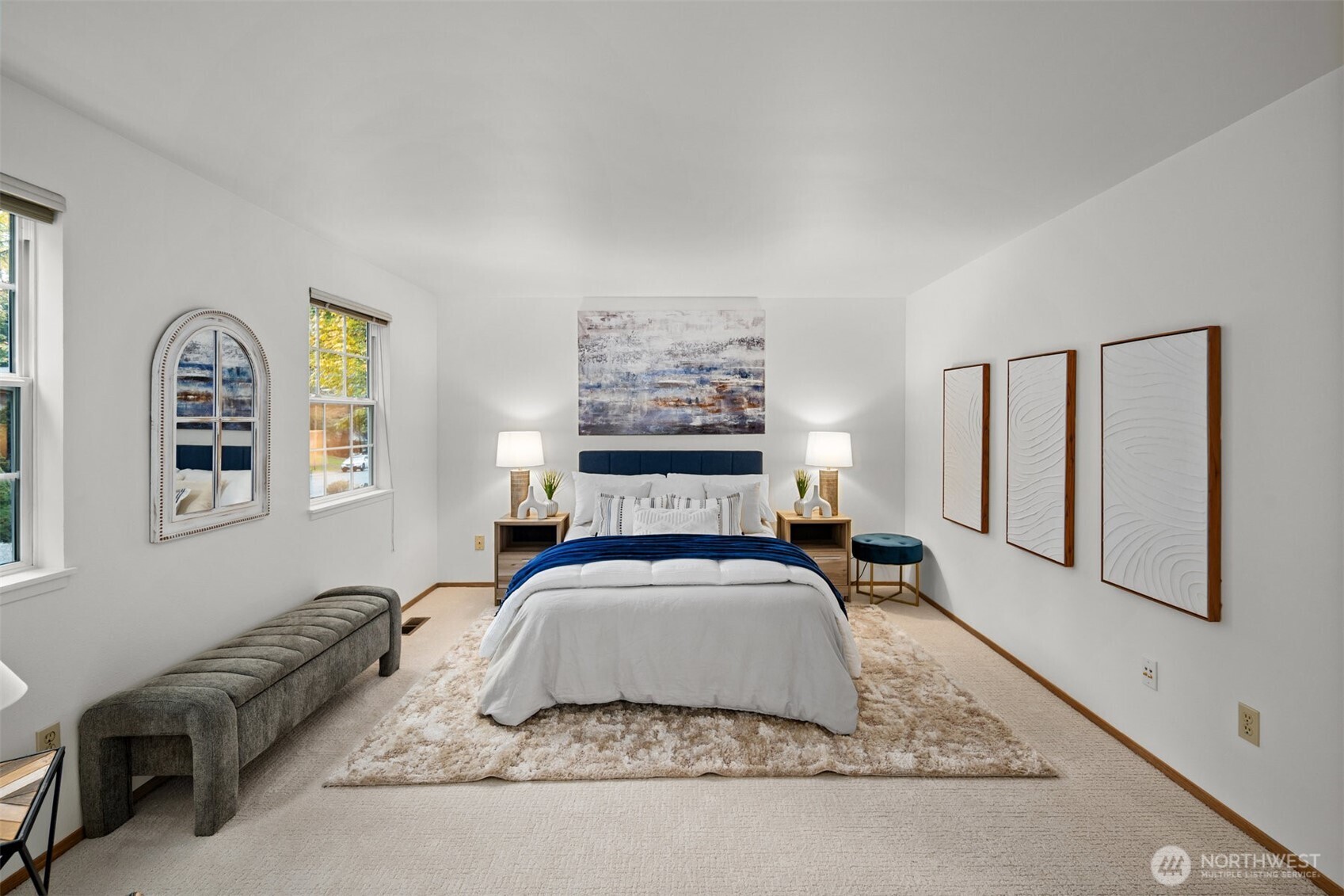 This beautifully designed primary suite offers ample space, creating a luxurious and comfortable retreat within the home.