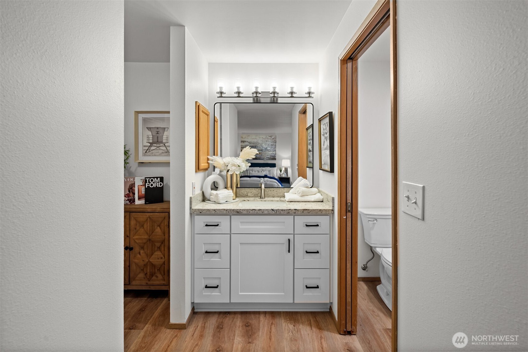 Brand new Primary suite vanity and toilet.