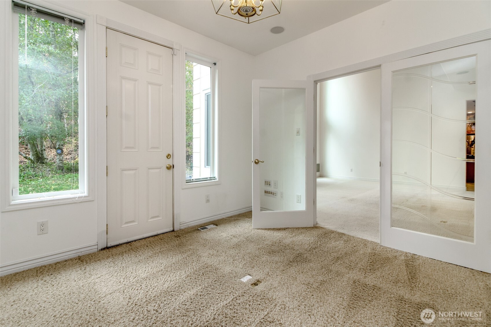 View from office/den looking into open concept living