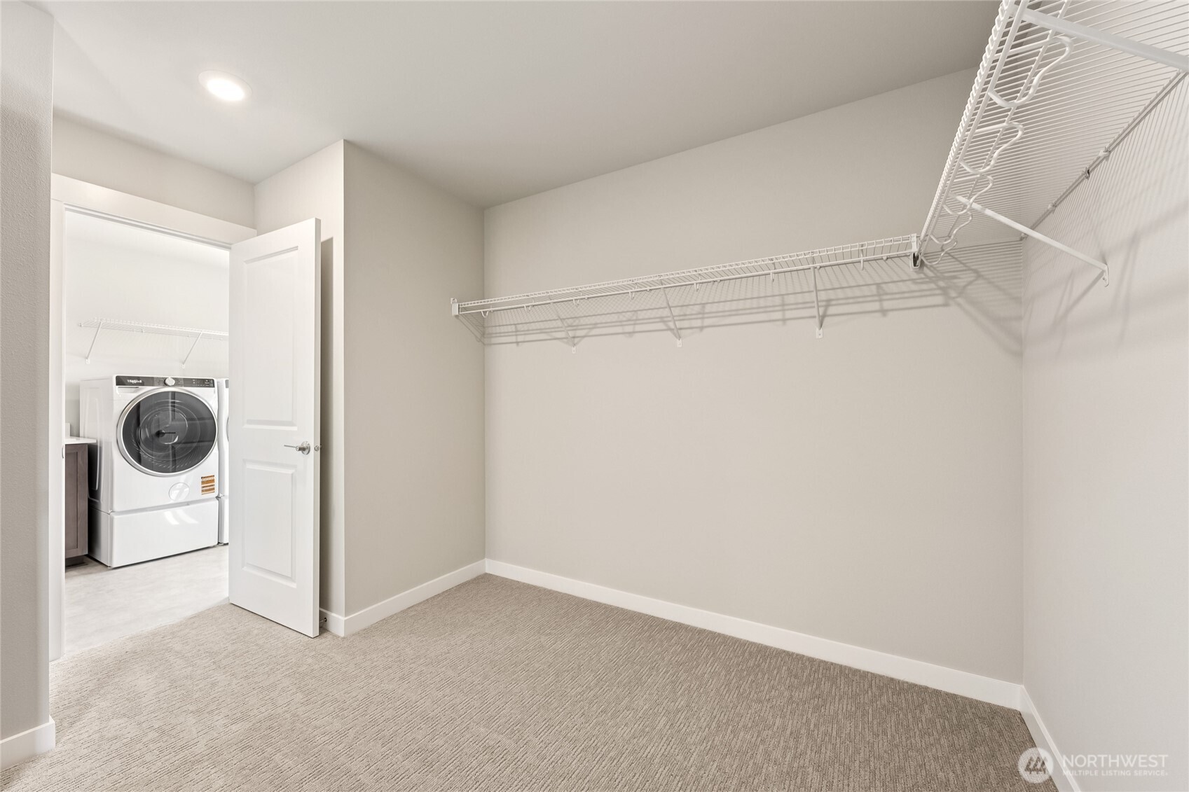 Showing similar sized closet (laundry room not connected in Violet plan - providing more storage in your closet)