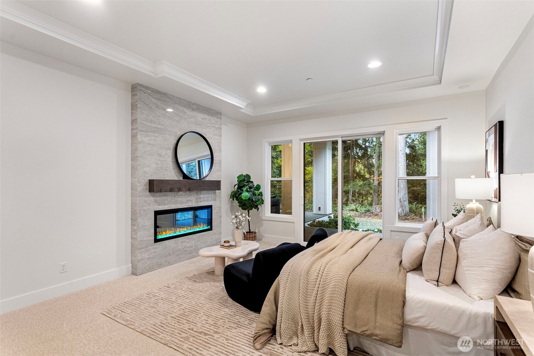 The main residence offers a spacious main-floor primary suite.