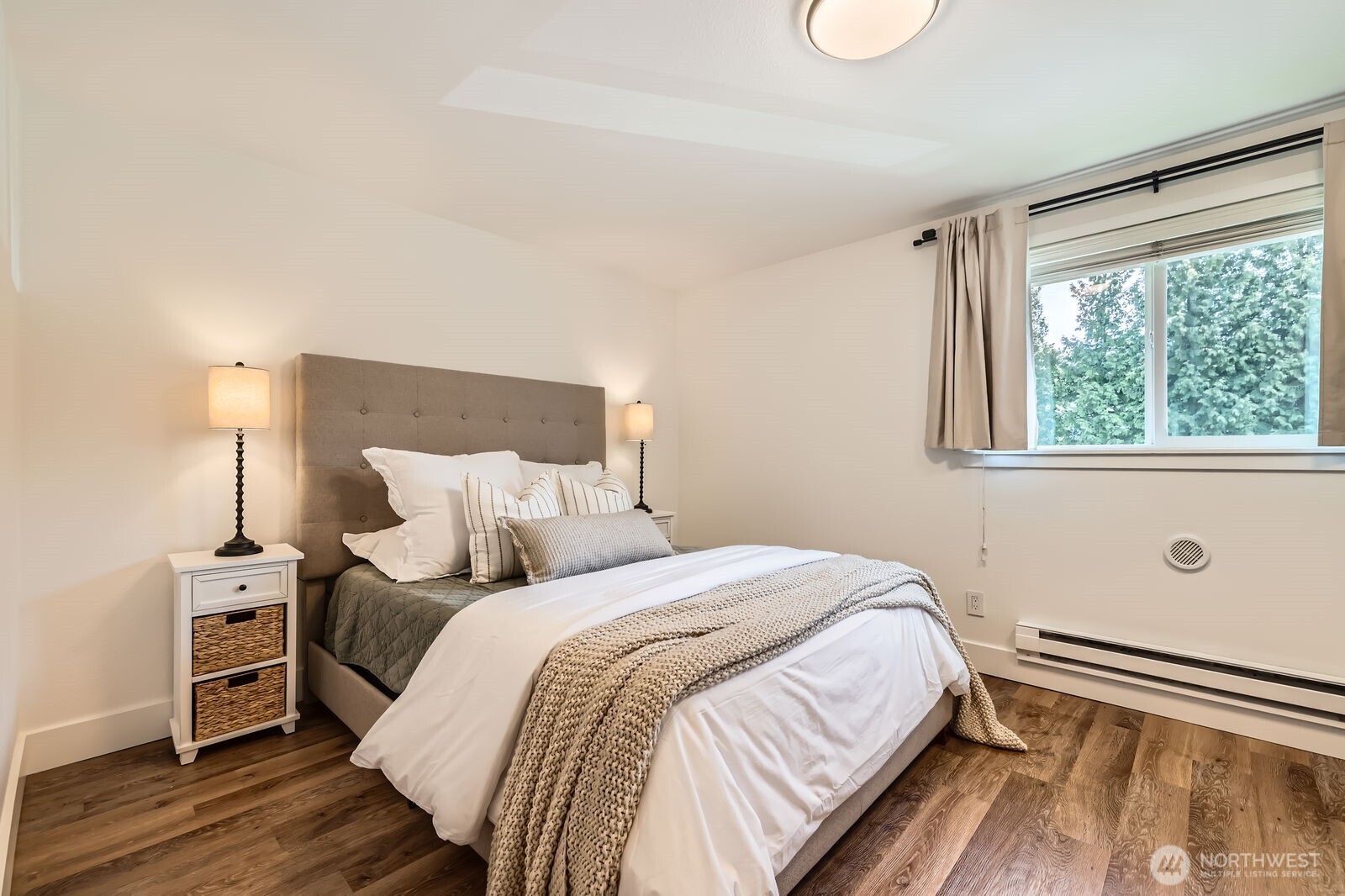 Spacious and bright bedroom with built in closets.