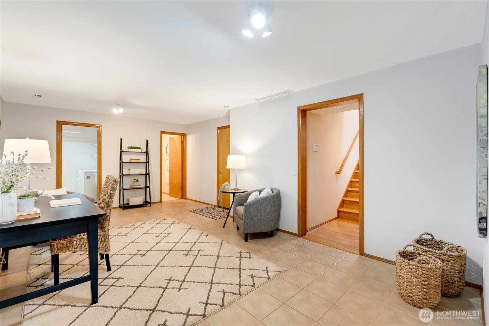 Spacious bonus room with tile floors, soft wall colors, and plenty of natural light. Perfect for a home office, play room, or guest space with flexibility for any lifestyle need.