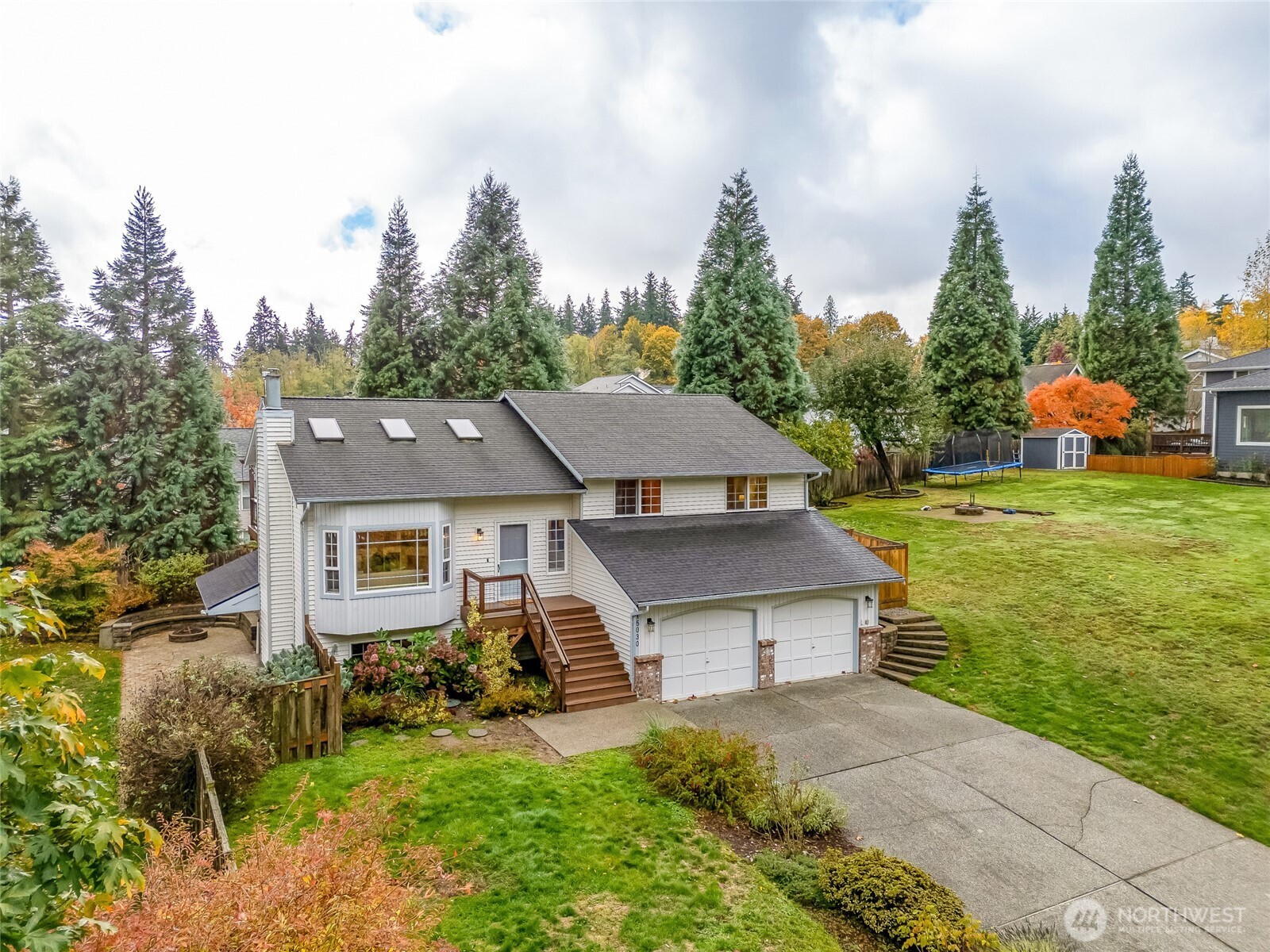Elevated perspective showing the home’s extra long driveway.