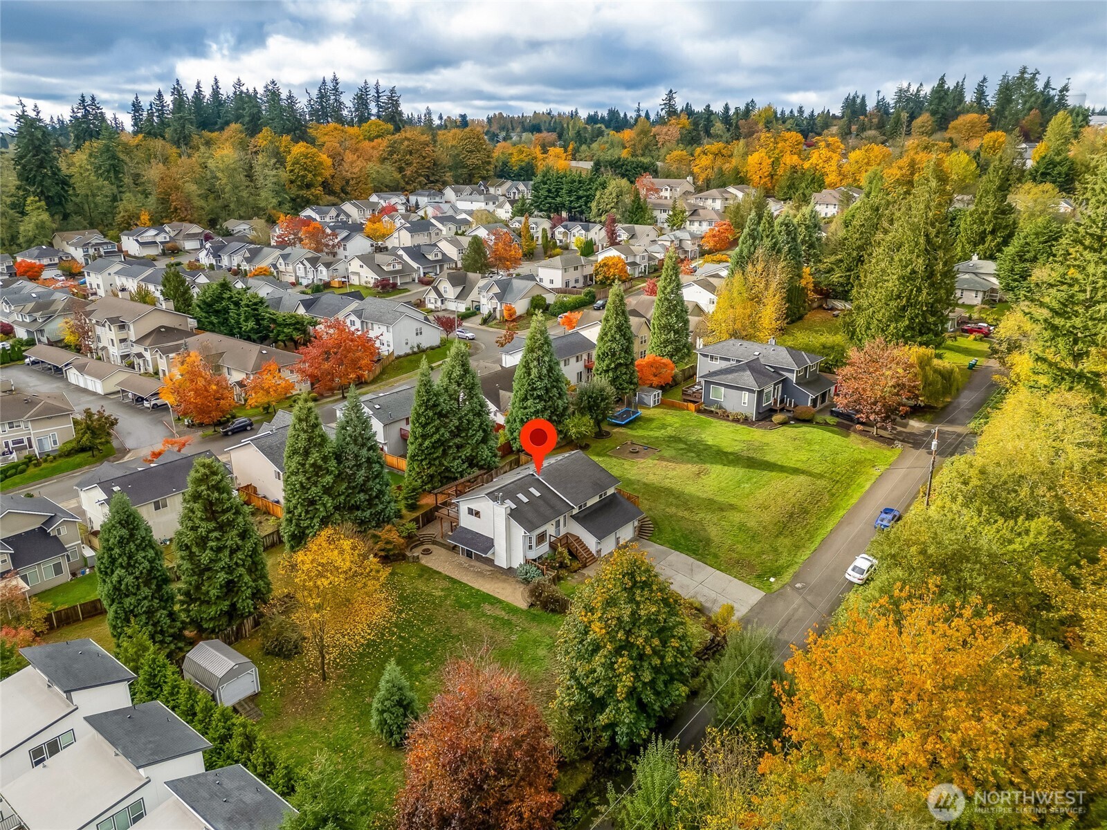 Bird’s-eye view showcasing the home’s ideal position within a quiet, well-kept neighborhood.