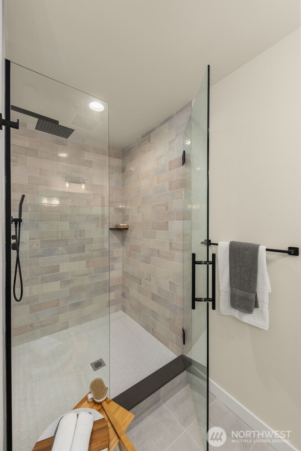 Indulge in the rain shower experience surrounded by beautiful tile and sleek finishes — a refreshing daily ritual reimagined in style.