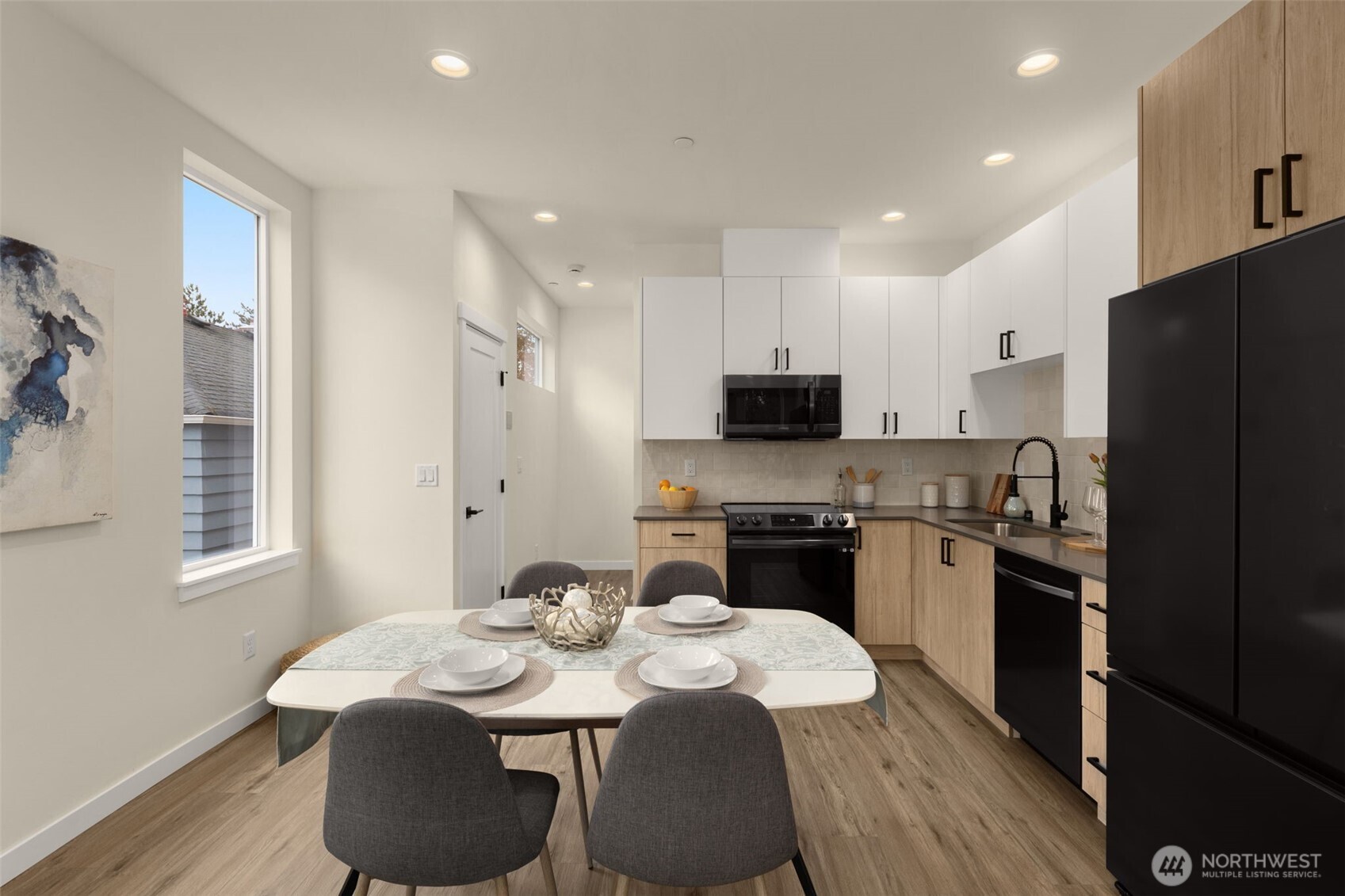 Thoughtfully designed for connection, this area merges kitchen, dining, and living spaces so you can cook, converse, and entertain without missing a moment.