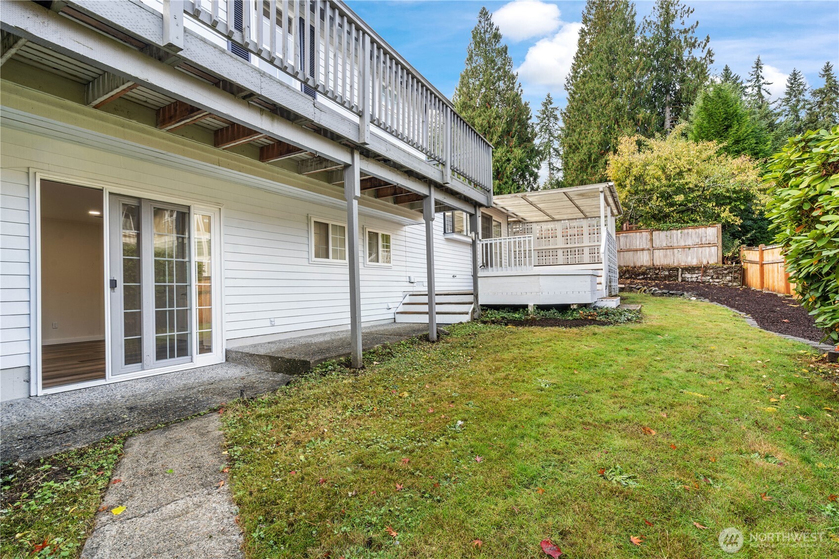 Backyard with grassy play area