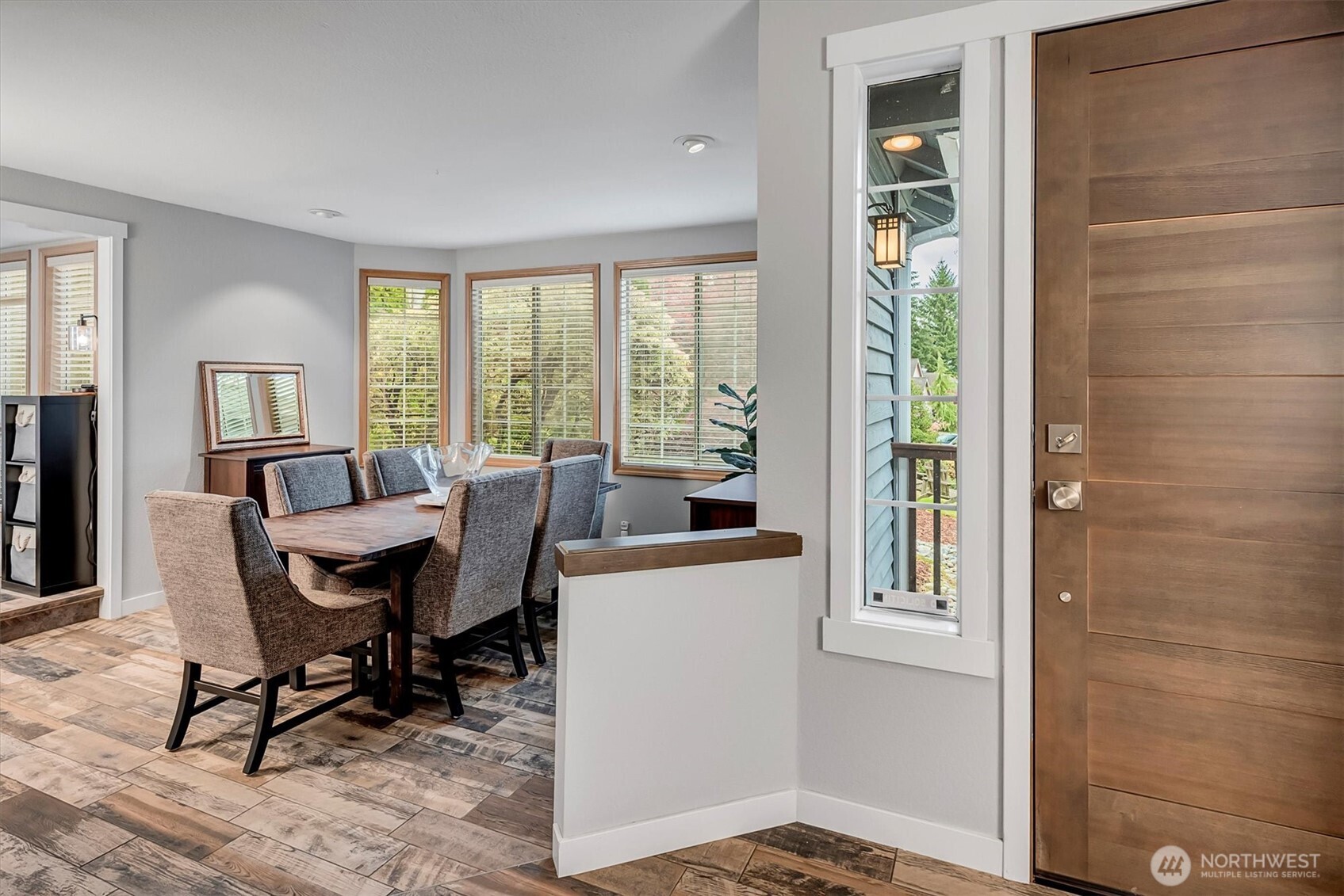 Living room is currently used as their dining area. Completely tiled throughout the home. No carpet!