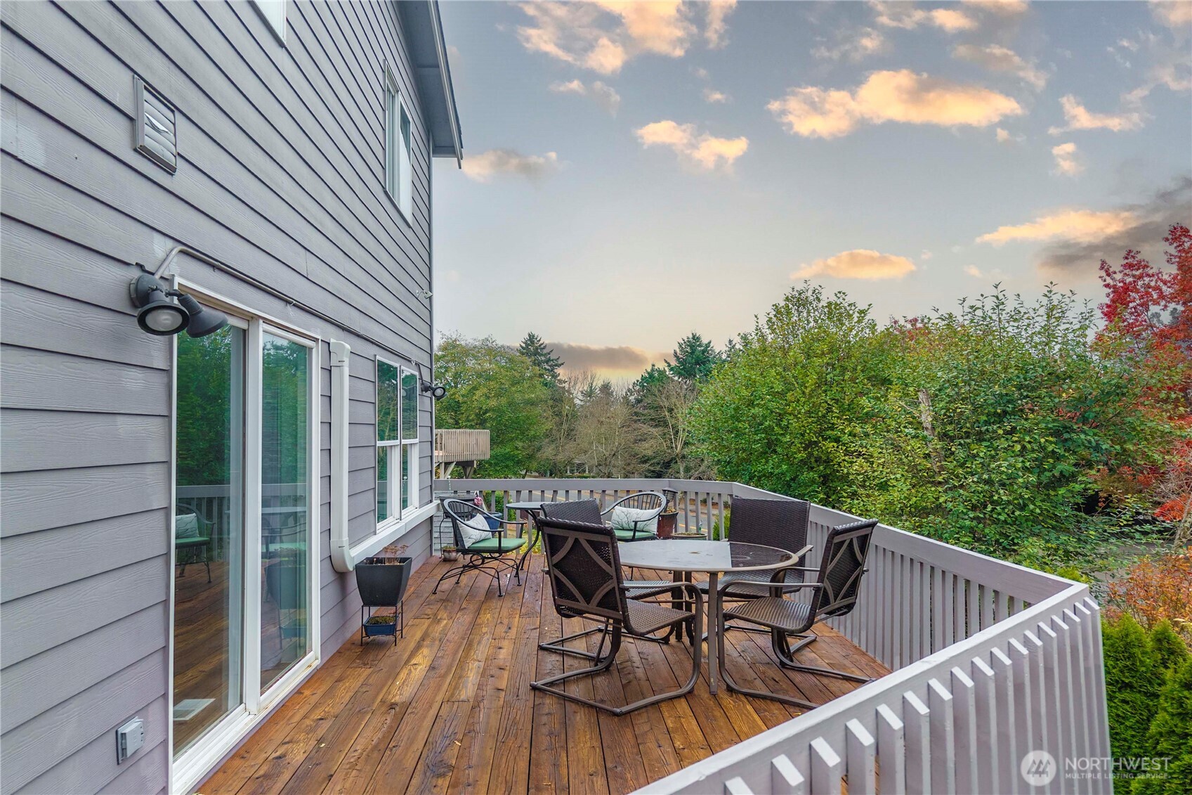 Step out onto your back deck and enjoy your morning cup of coffee with stunning views of your backyard oasis.