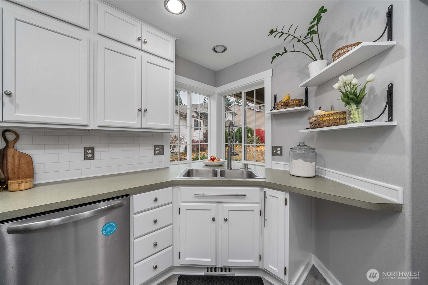 Freshly painted cabinets and new backsplash!