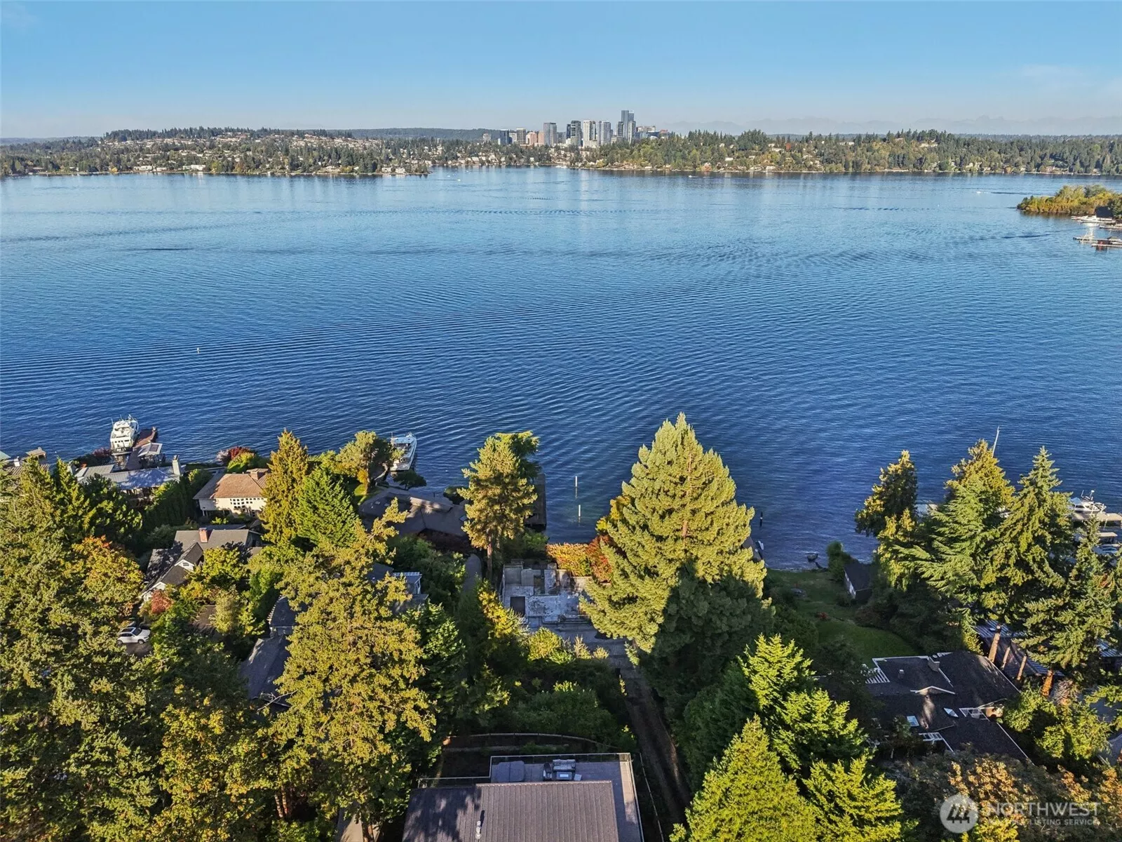 With over 82 feet of private shoreline, a gated entry, and lush natural surroundings, this property offers the perfect blend of privacy and serene waterfront living.