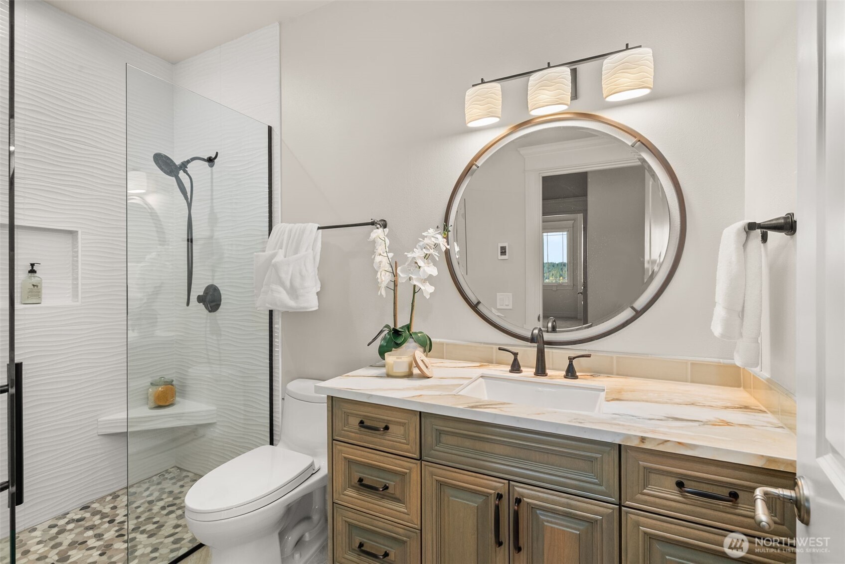 A curbless shower in the ADU bathroom.