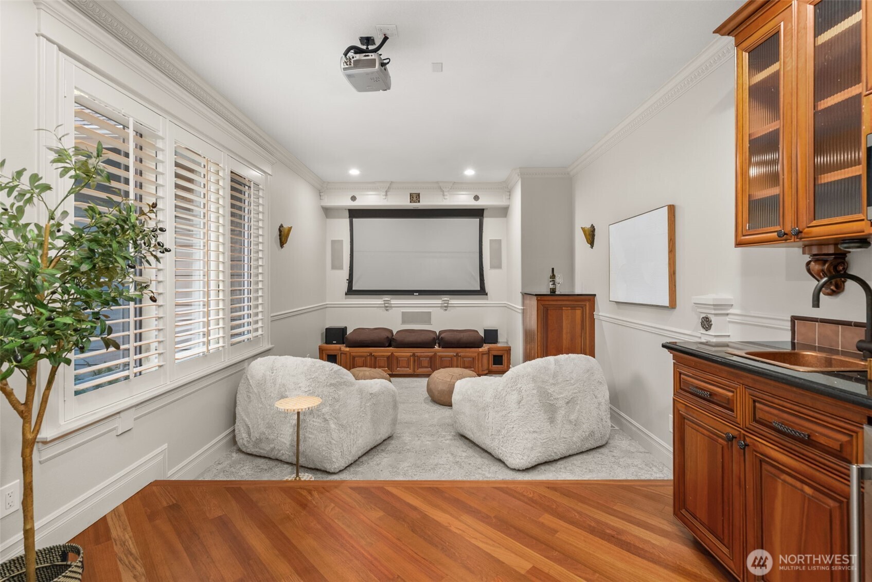 Unwind at the end of the day with a movie in the media room, complete with a wet bar and beverage fridge.