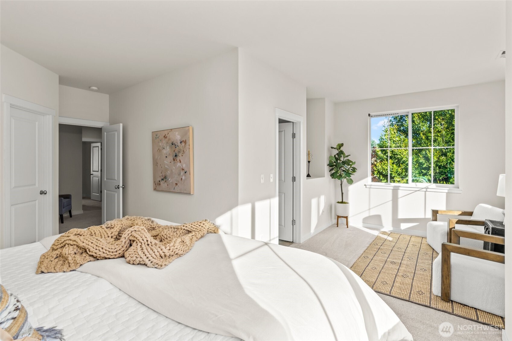 Views of Thomas Lake from the primary bedroom.