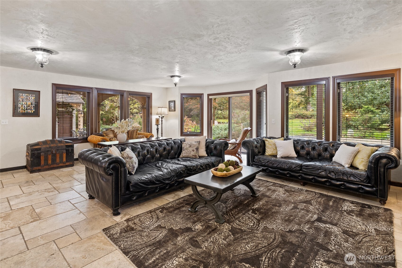 Sleek & Resiliant Caesarstone Quartz with a Modern Roman Flower Mosaic Marble Backspash, beautifully paired with Superior Quality Dura Supreme Custom Cherry Wood Cabinets