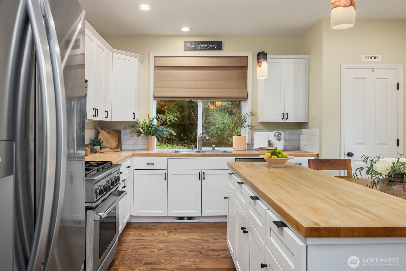 The kitchen cabinetry was just professionally refinished.