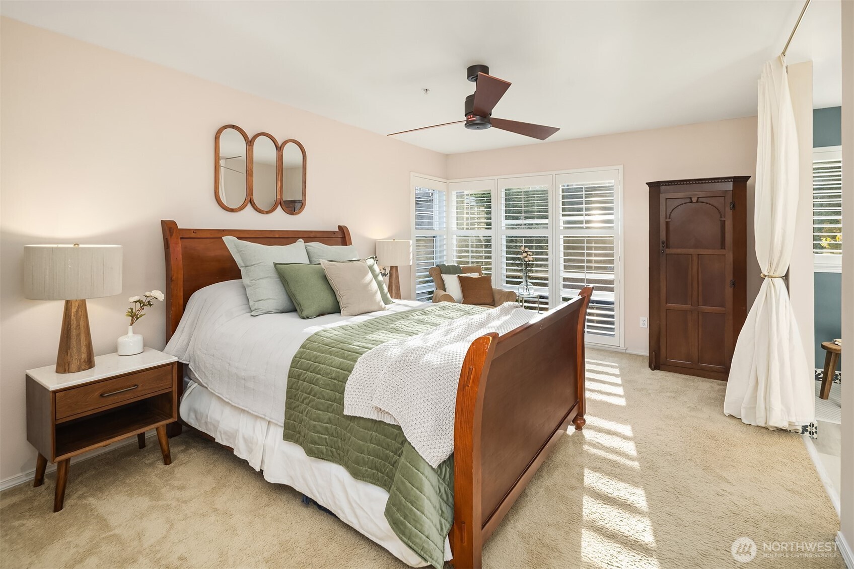 Don't miss the exterior sun shade (leveraged via remote control). The exquisite plantation shutters really elevate this room.