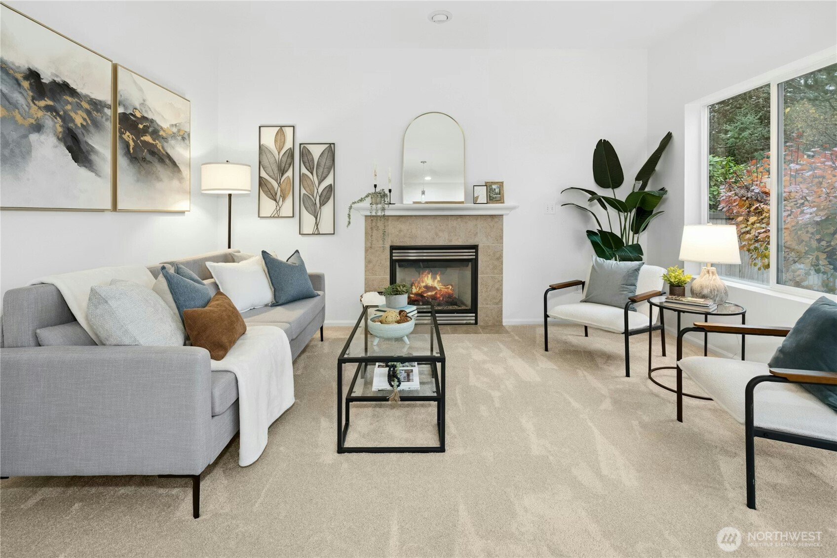 Light filled Family Room with gas fireplace.