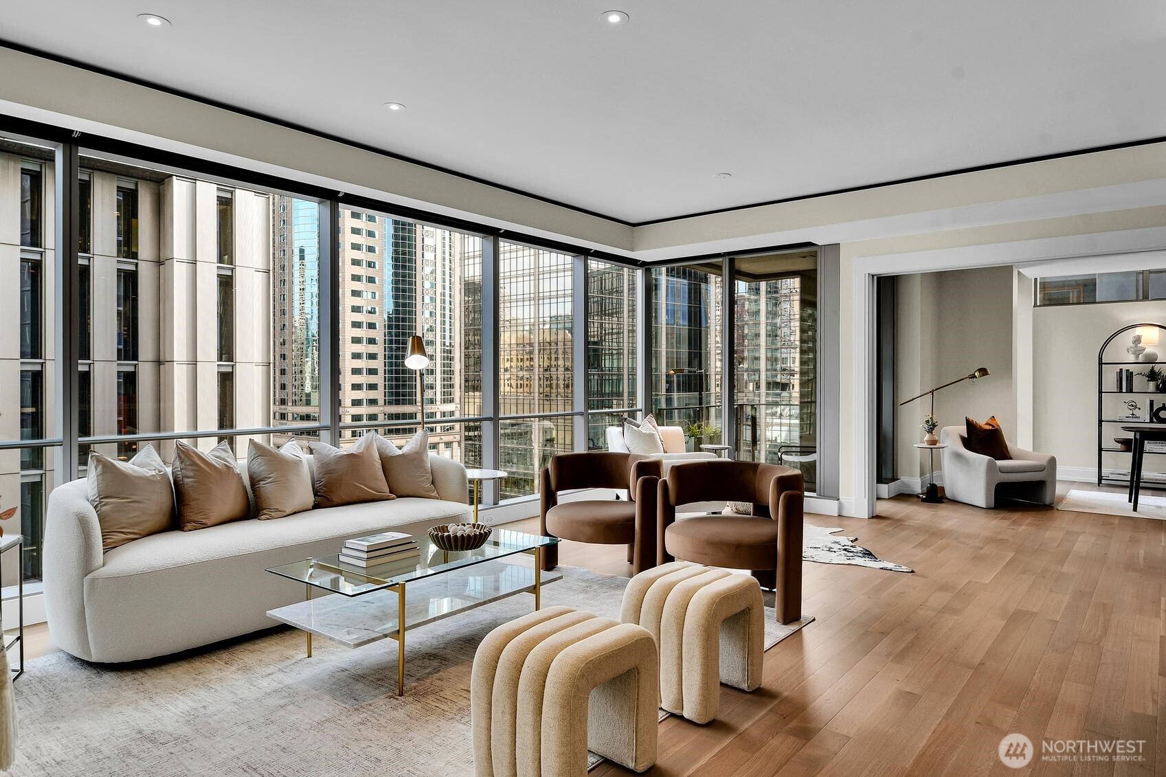 Living room in Unit 1205 flows into den/office