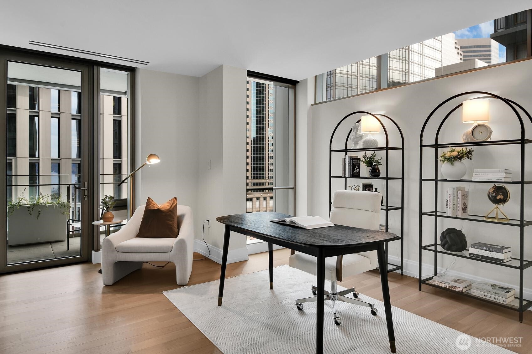 A covered deck is accessed from the den/office in Unit 1205