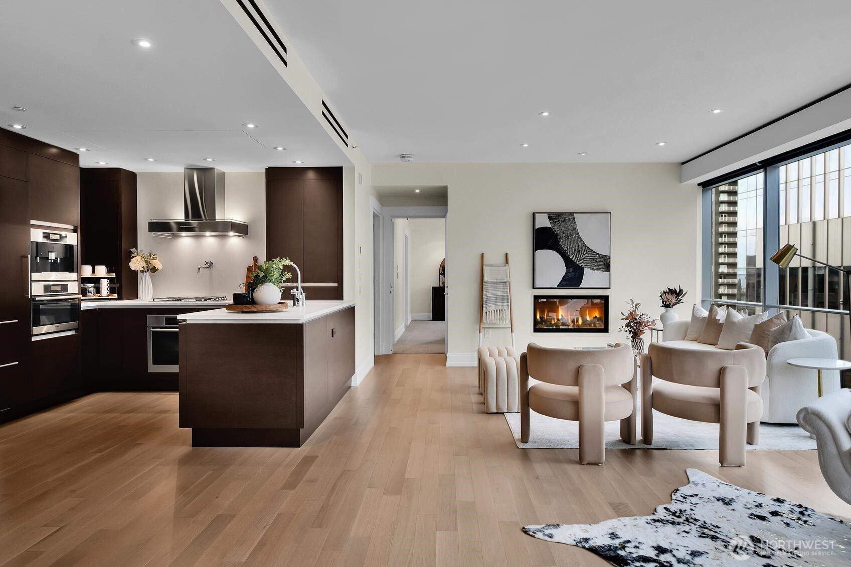 Unit 1205 kitchen is open to the living room