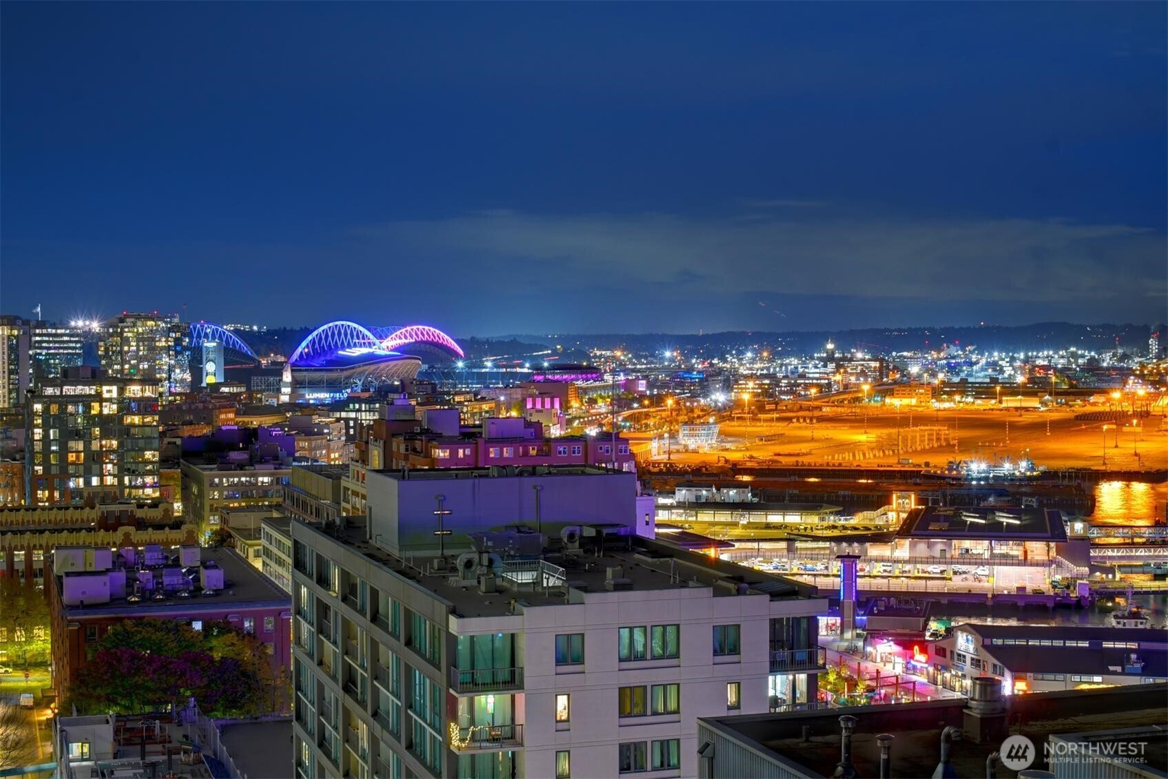 Night view of the Stadium District and Port of Seattle from the Unit 1206 deck