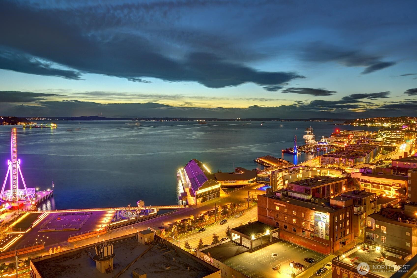The Waterfront District and Great Wheel light up the night from the Unit 1206 deck