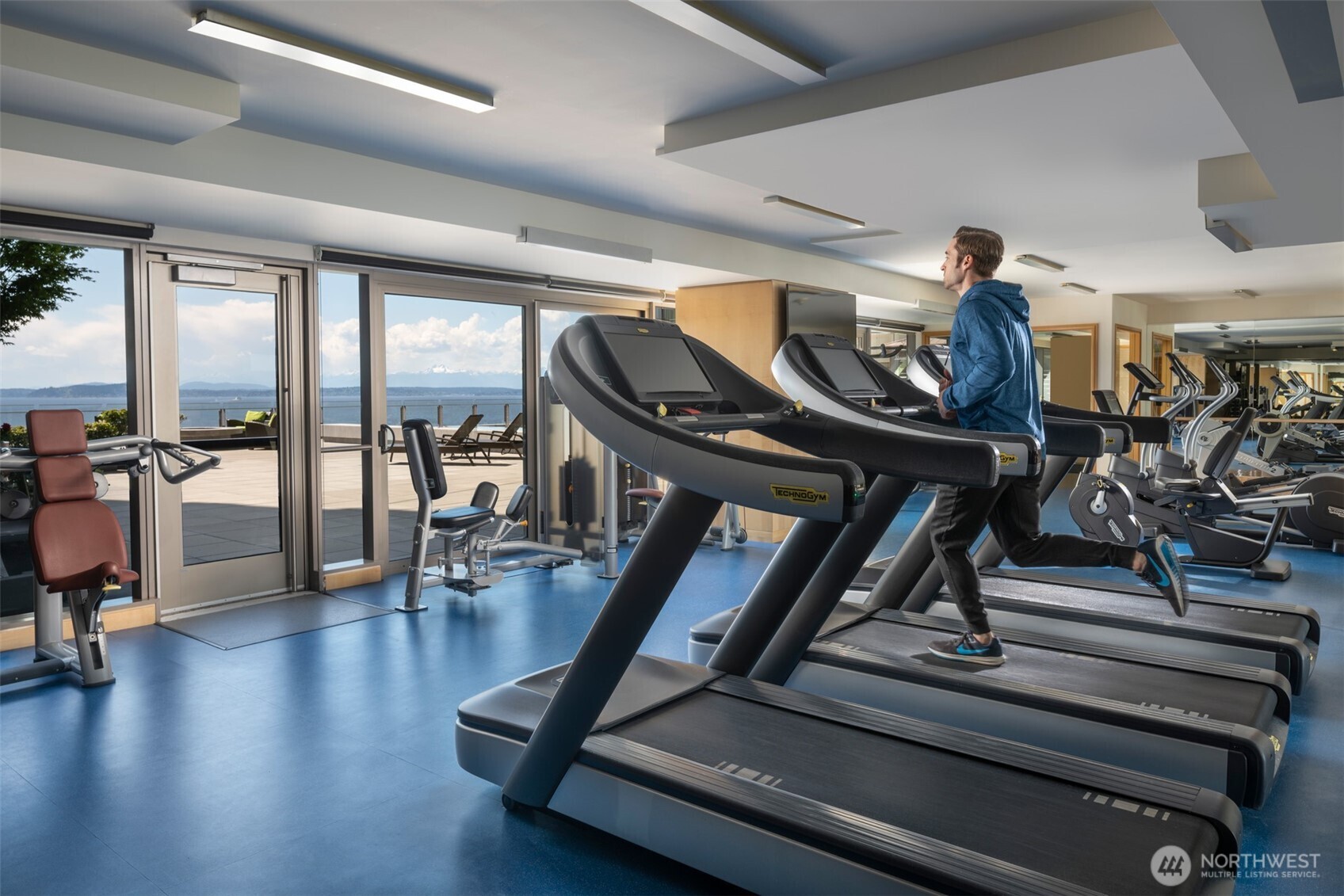 Fitness Center and Spa are located near the pool deck at the Four Seasons Hotel & Private Residences