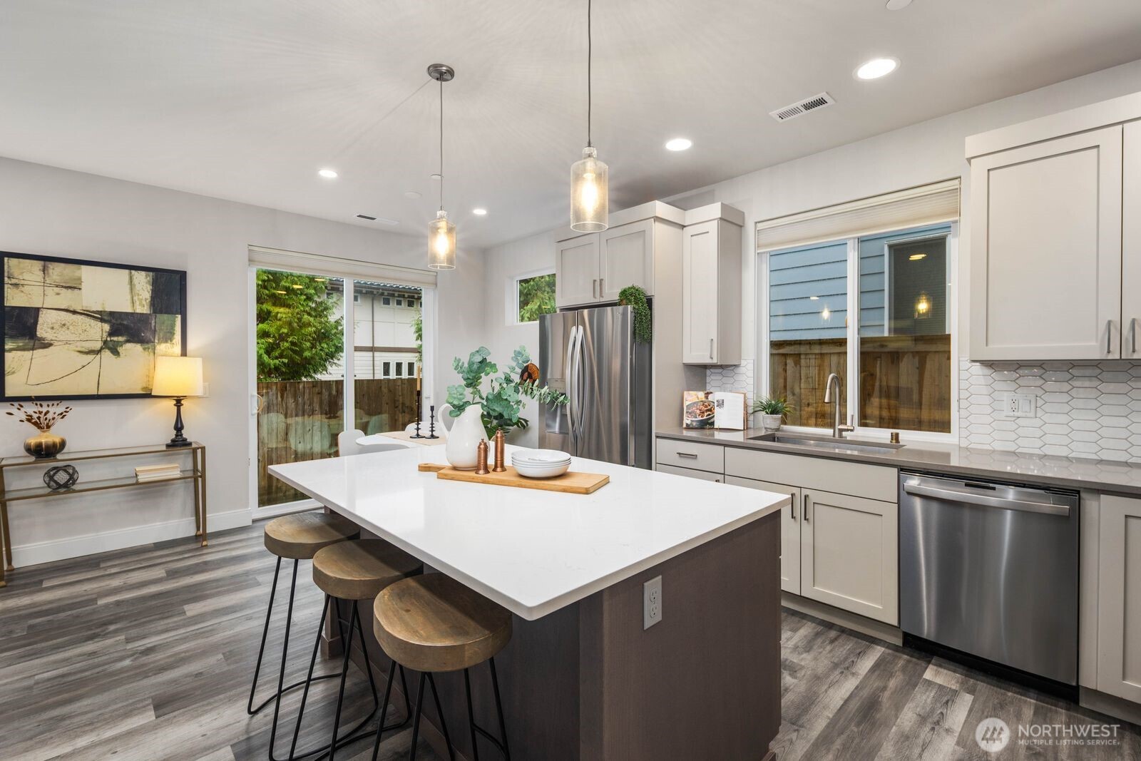 Slider out to the patio and wraparound yard.