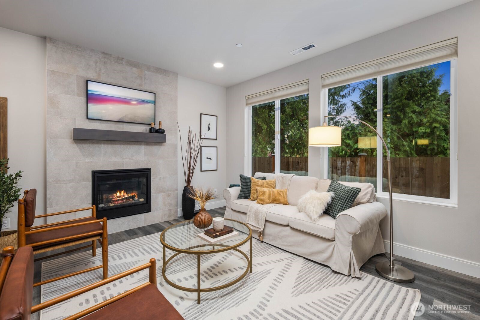 Main floor living room with gas fireplace, Frame TV included!