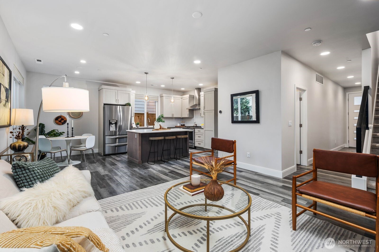 Open living/kitchen/dining on the main level.