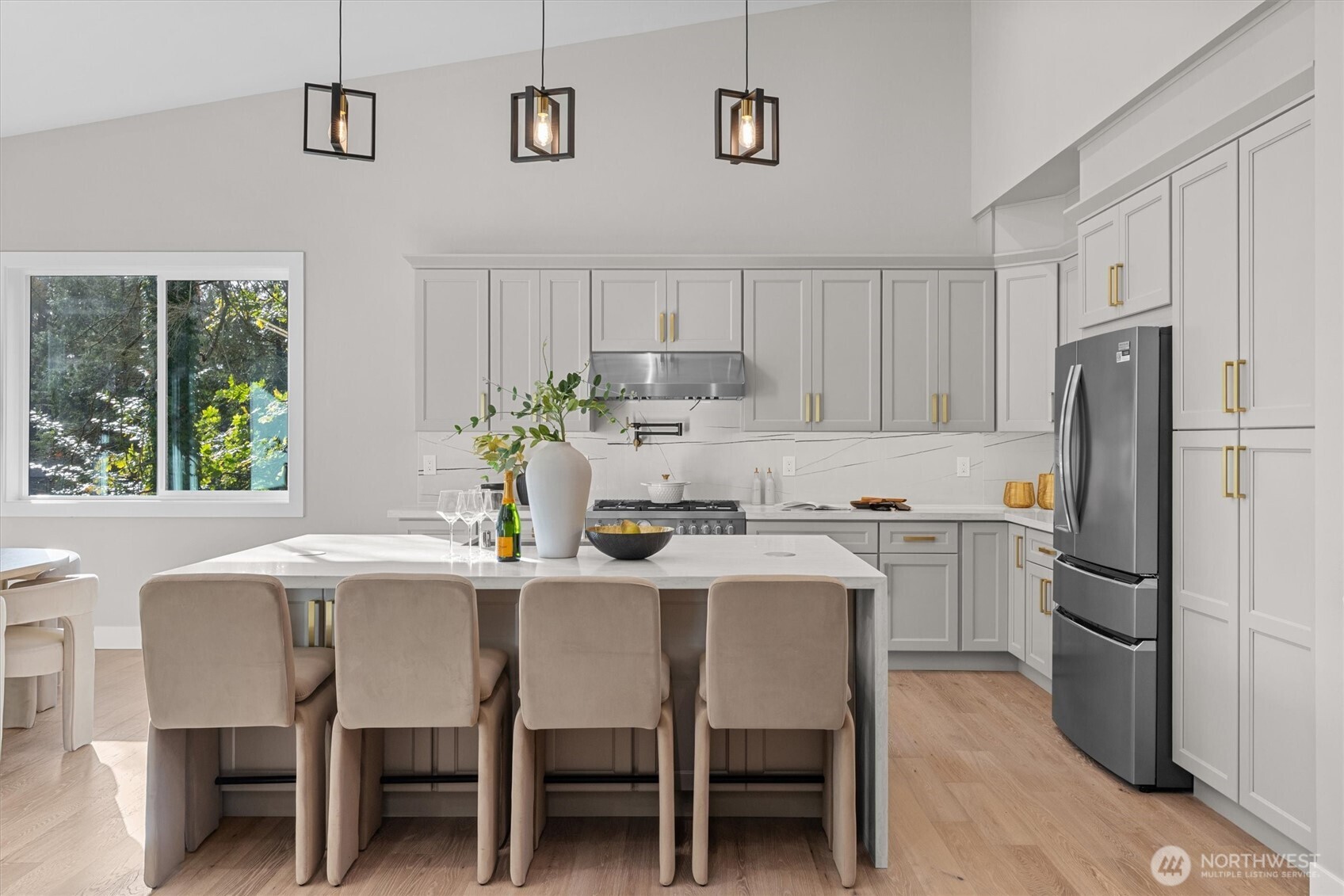 Island with gorgeous waterfall on the slab countertops