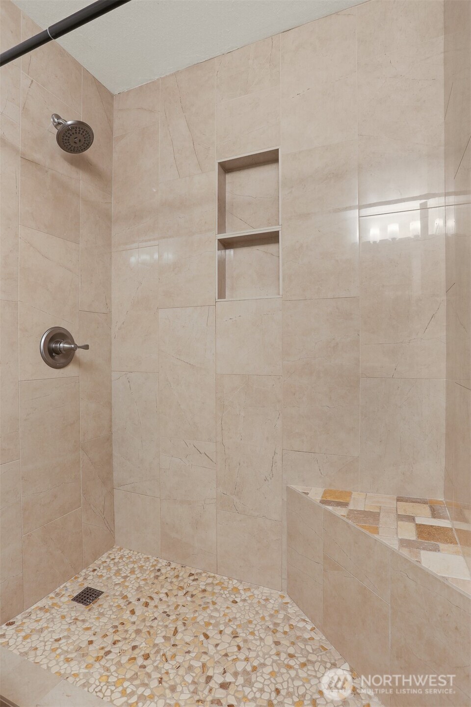 Remodeled shower in hall bath on main floor