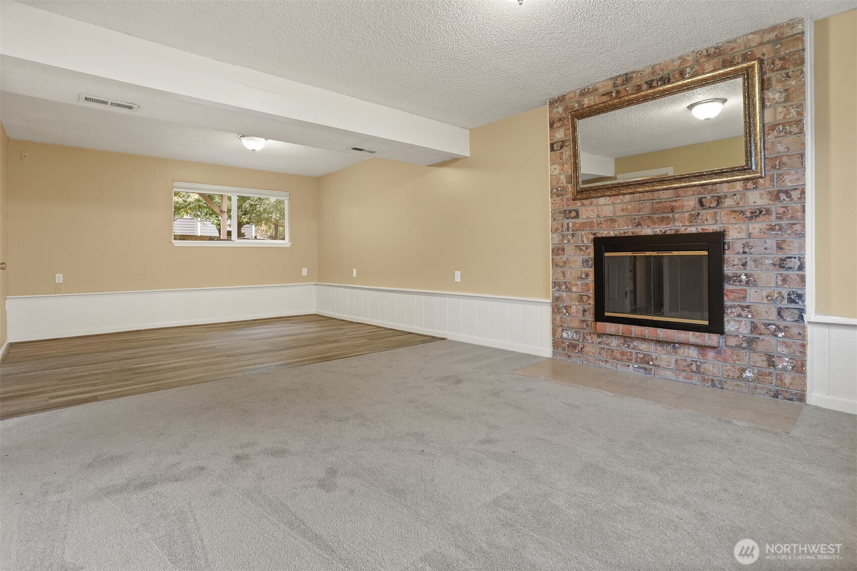 Lower level rec room with room for office too!