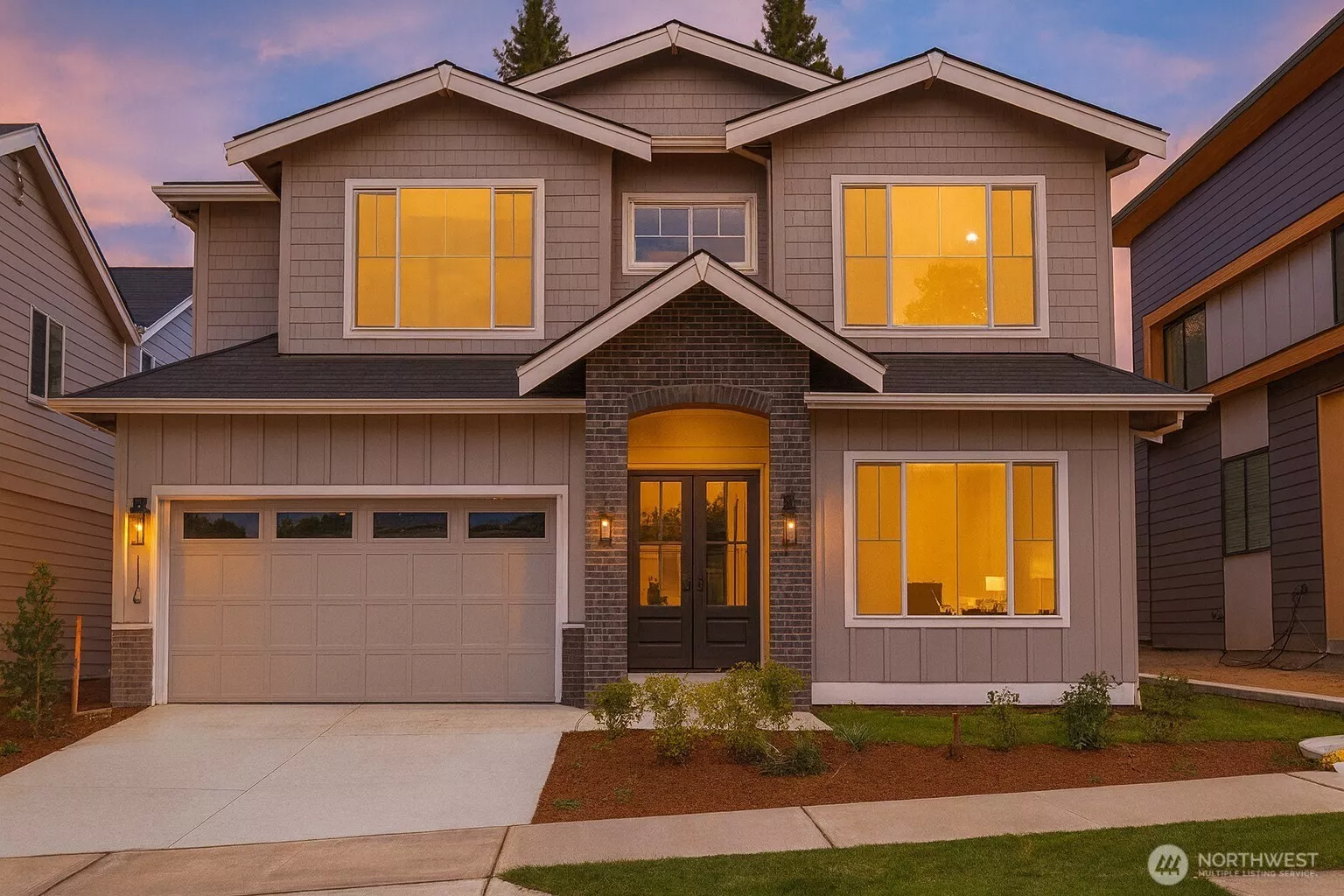 Timeless elegance in the heart of Lower Kennydale — this stunning two-story residence welcomes you with clean architectural lines, designer gray siding accented by rich brick detailing, and a striking covered entry framed by double doors. Impeccably landscaped with a wide driveway and pristine curb appeal, this home blends sophistication with inviting warmth