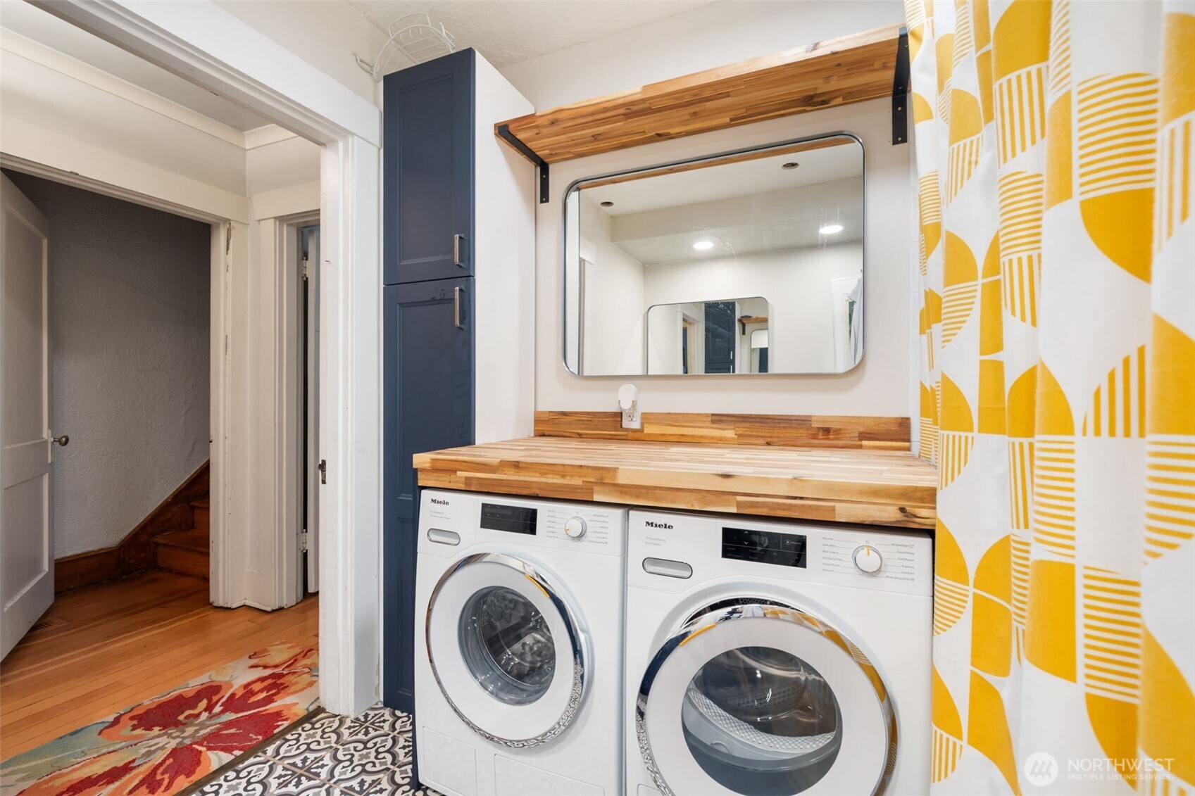 Laundry tucked in and close to the Primary Bedroom