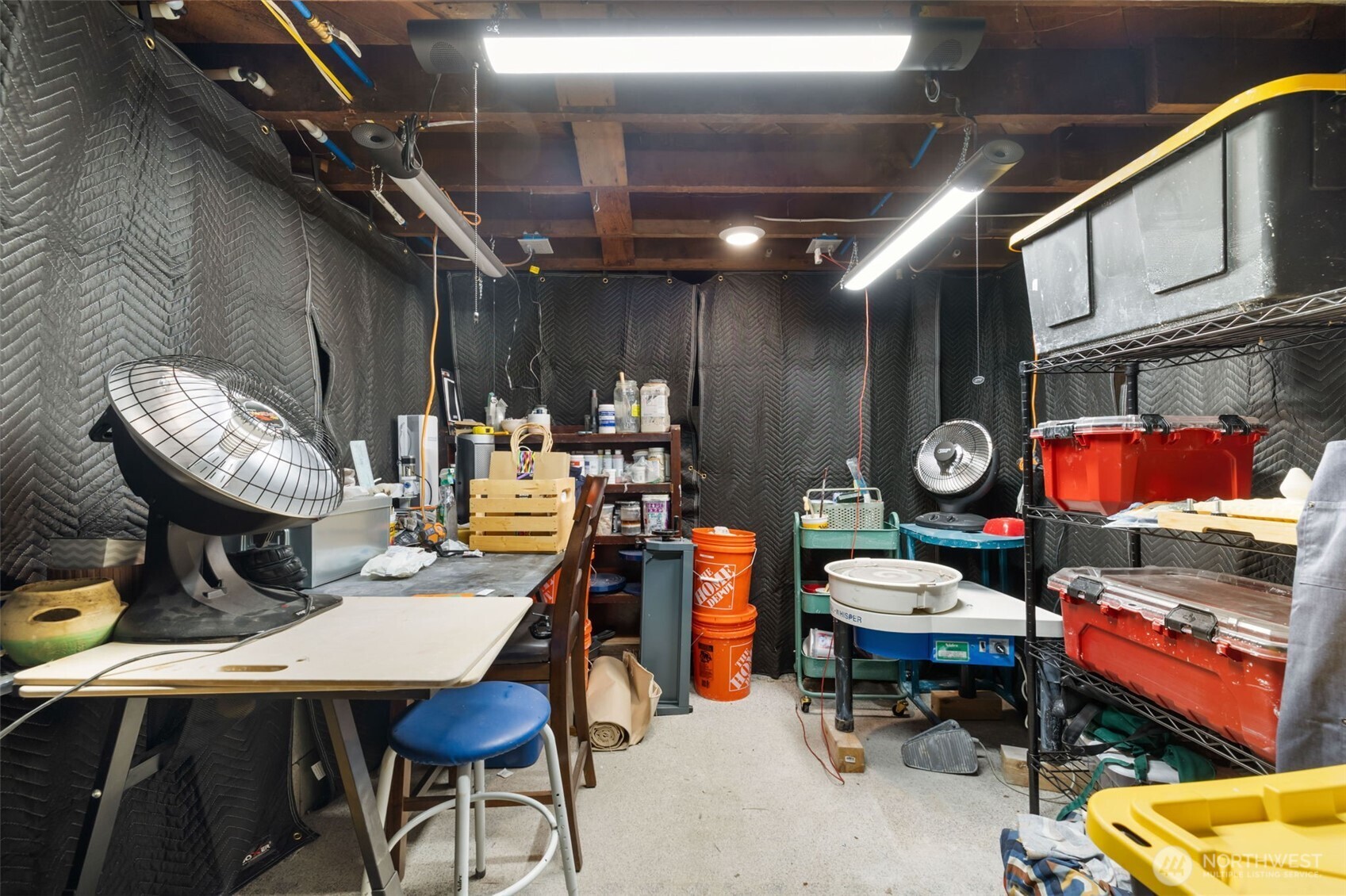 Tucked away in the basement is an area perfect for an art studio
